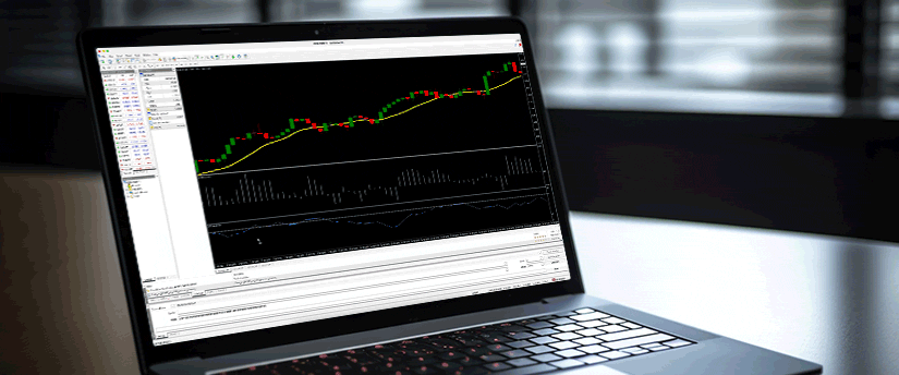 A laptop with an open screen showing a detailed trading chart, highlighting forex trading skills essentials analysis MT4 and market fluctuations.